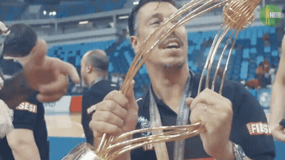 Man Holding Trophy With Sesi Shirt GIF