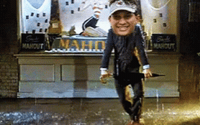 Man Holding Umbrella In Front Of Maho Sign GIF