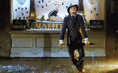 Man Holding Umbrella In Rain At Mahout Store GIF