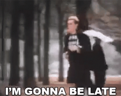 Man Holding Umbrella Saying I'm Gonna Be Late Walking Through Forest GIF