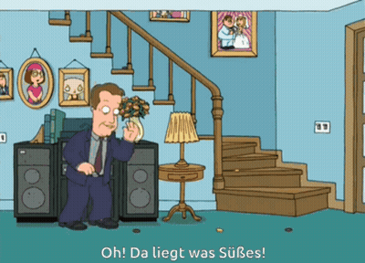 Man Holding Vase Of Flowers Oh Da Liegt Was Süßes GIF