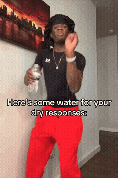 Man Holding Water Bottle Saying Here's Some Water For Your Dry Responses GIF