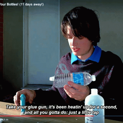 Man Holding Water Bottle Saying Take Your Glue Gun GIF