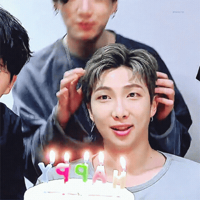 Man Holding White Cake With Candle GIF
