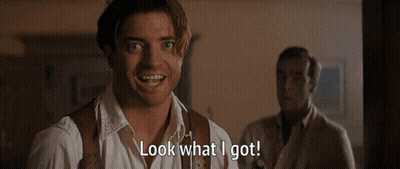 Man Holding White Cat Saying Look What I Got GIF