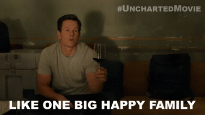 Man Holding Wine Like One Big Happy Family GIF