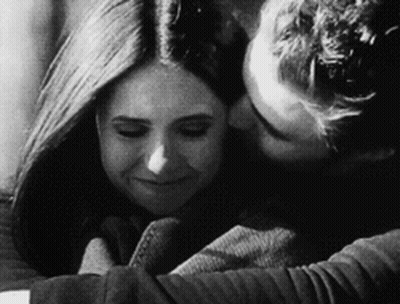 Man Holding Woman And Kissing GIF