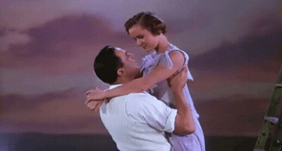 Man Holding Woman Dancing GIF