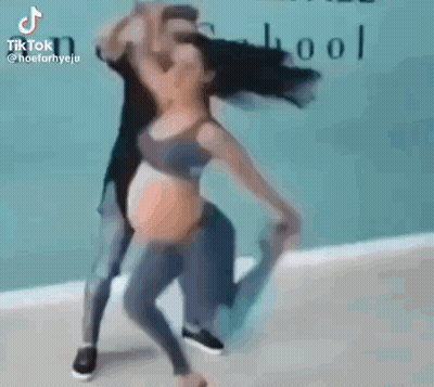 Man Holding Woman Dancing GIF
