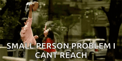Man Holding Woman In Arms GIF