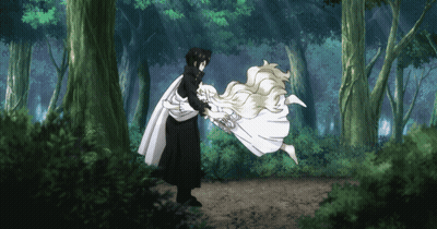 Man Holding Woman In Forest GIF