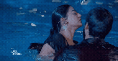 Man Holding Woman In Water GIF