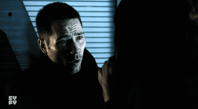 Man Holding Woman's Hand In Front Of TV Saying Su Fy GIF