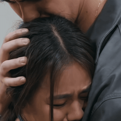 Man Holding Woman's Head GIF