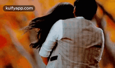 Man Holding Woman While Dancing GIF