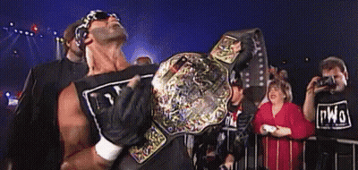 Man Holding Wrestling Belt GIF