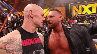 Man Holding Wrestling Championship Belt In Boxing Ring GIF