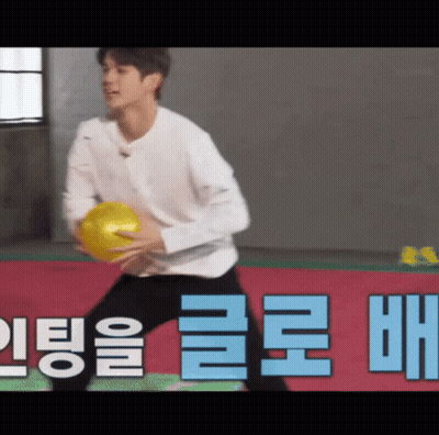 Man Holding Yellow Ball GIF