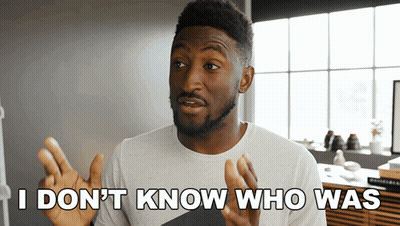 Man Holding Yellow Ball In Gym GIF