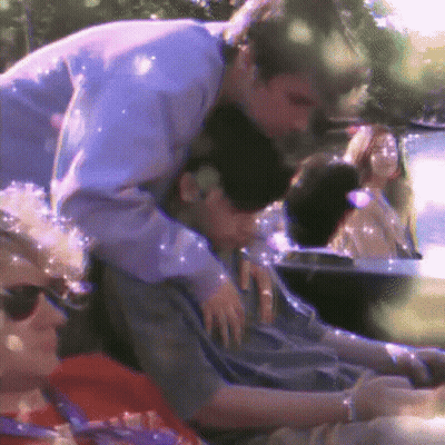 Man Hugging Another Man In Car GIF