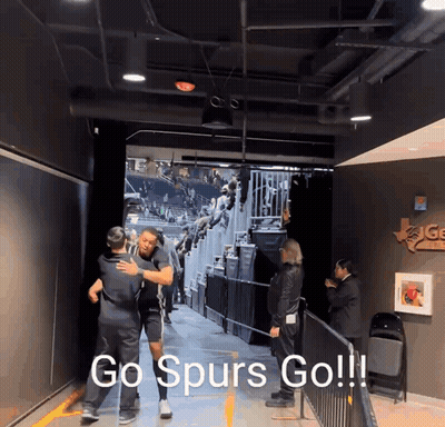 Man Hugging Another Man In Tunnel Go Spurs Go GIF