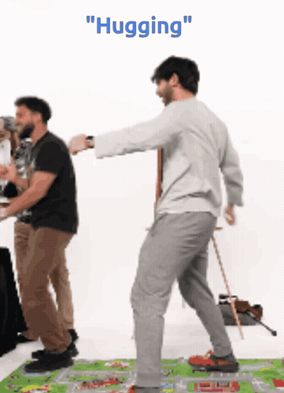 Man Hugging Another Man on Rug