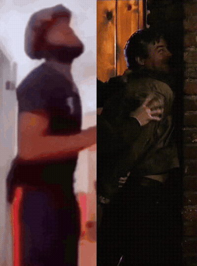 Man Hugging Man Beside Brick Wall GIF
