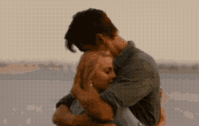 Man Hugging Woman