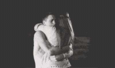 Man Hugging Woman In Black And White Photo GIF