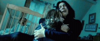 Man Hugging Woman In Dark Room GIF