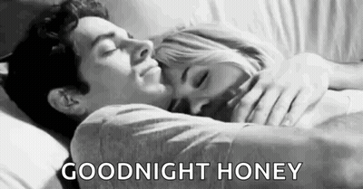 Man Hugging Woman Sleeping In Bed GIF