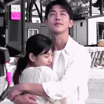 Man Hugging Woman With Noise Sign GIF