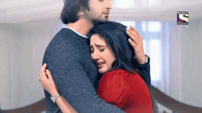 Man Hugging Woman With Sony Television Logo GIF