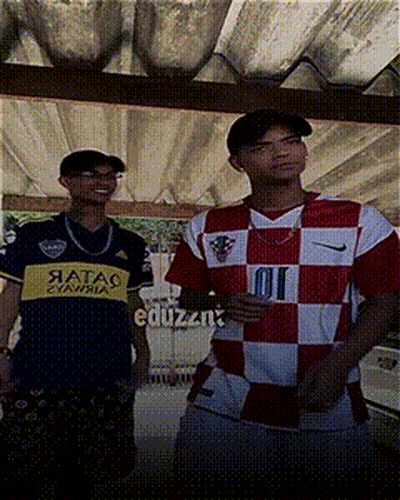 Man In 01 Jersey Next To Another Man GIF