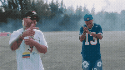 Man In 15 Jersey Beside White Shirt Man GIF