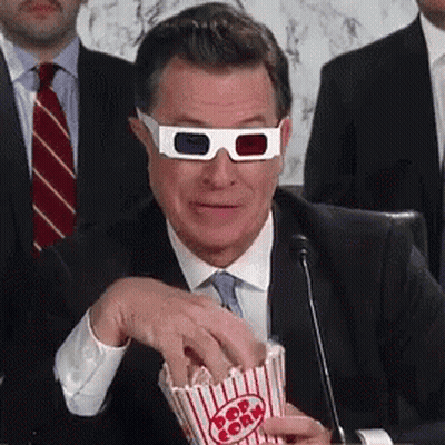 Man In 3D Glasses Eating Popcorn GIF