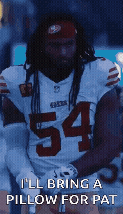 Man In 49Ers Jersey Kneeling With Pillow GIF