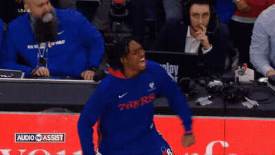 Man In 76Ers Sweatshirt Dancing On Basketball Court GIF