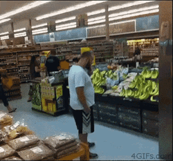 Man In A Banana Costume Drop Kick On Supermarket GIF