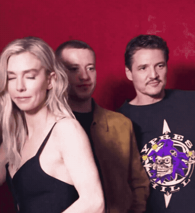 Man In A.P.R.E. Shirt Next To Woman GIF
