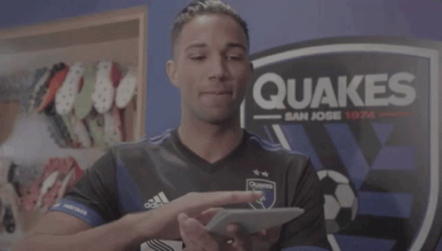 Man In Adidas Shirt Holding Box GIF