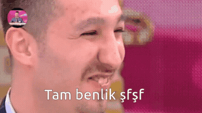 Man In Adidas Shirt Holding Sign Number 6 GIF