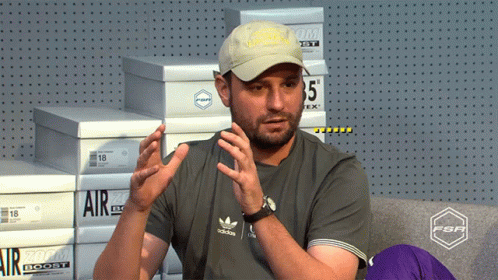 Man In Adidas Shirt Sitting GIF
