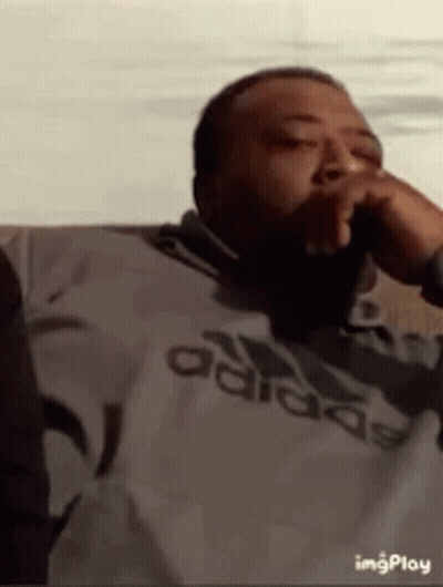 Man In Adidas Sweatshirt Smoking GIF