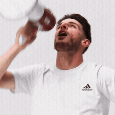 Man In Adidas T-Shirt Holding Bottle GIF
