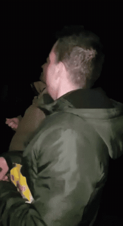 Man In Airborne Shirt Covering Face GIF