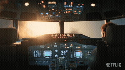Man In Airplane Cockpit With Netflix Logo GIF