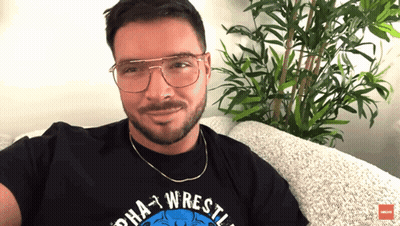 Man In Alpha Wrestling Shirt GIF