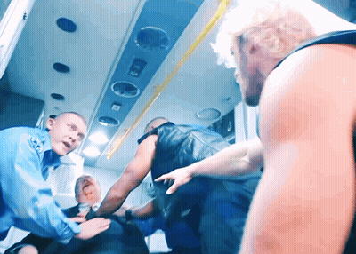 Man In Ambulance Helped By Paramedic GIF