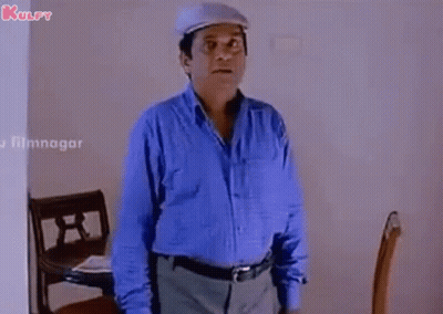 Man In American Flag Bandana Looking At Camera GIF